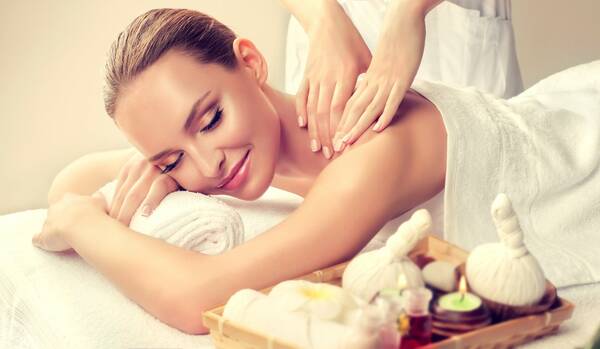 Moorpackung und Rückenmassage
